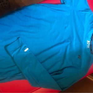 Russell, youth XL, long sleeve,Teal in color